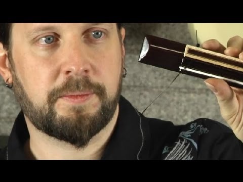 how to fasten nylon guitar strings