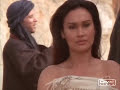 a video clip of sydney fox (tia carrere) dressing in the episode 