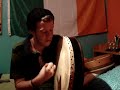 Me playing my old Bodhran