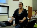 lisa in class during a break talking to boyle