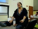 lisa in class during a break talking to boyle
