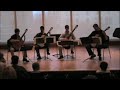 the macphail suzuki guitar quartet playing ellis island by ben verdery.  the piece was filmed in antonello hall at macphail in minneapolis, mn.  the players from left to right are christopher, stephen, david, and tommy.  i hope you enjoy it and feel free to comment.