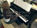 me playing a piano piece by liz story.