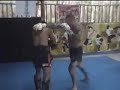 Tom Schnieder (Muay Thai Coach) works pads with Kru Phet Tom Schnieder (Muay Thai Coach) works pads with Kru Phet