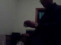 Chinese grandfather doing Tai Chi Kung Fu in Shanghai China