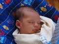 22 day baby listens to Bach, smiles in sleep 22 day baby listens to Bach, smiles in sleep
