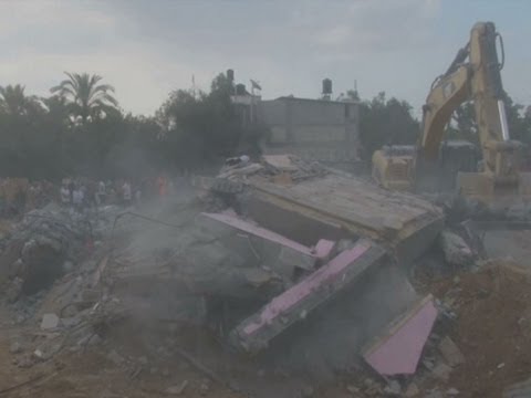 Family - Bulldozers and rescue crews were clearing rubble on Monday from a building in southern Gaza that was hit by an Israeli airstrike on Sunday evening, killing 25 members of the same family, according...
