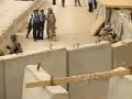 معركه بين الشرطه والحرس على مؤخرة السستاني دام ذله