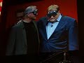 Drew Carey and IBM executive Robert Leblanc play...