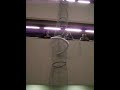 Dropping a bottle down the Recycling Sock