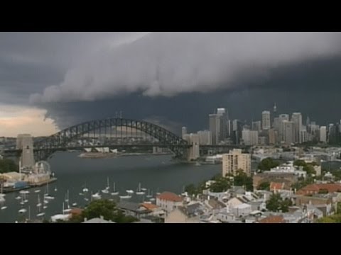 storm - Subscribe to ITN News: http://bit.ly/1bmWO8h Huge storm clouds rolling in over Sydney Harbour have been caught on a timelapse camera. The storm on Wednesday ...