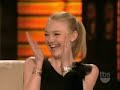 Kat Von D gives Dakota Fanning Cherry Bomb tattoo on Lopez Tonight