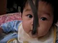 baby girl drooling with mohawk