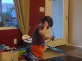 Zachary talking on the phone with Poppy