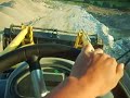 driving with new Komatsu WB 97 S backhoe to work