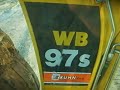 driving with new Komatsu WB 97 S backhoe to work
