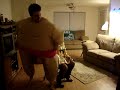 someone getting a lap dance from a guy in a fat suit.