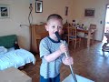 small child is singing hare krishna song