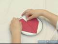 How to Fold Napkins : How to Make a Heart Fold in a Napkin