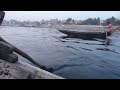 sadarghat boatman cuts through buriganga