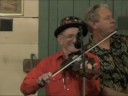the claude lucas bluegrass band: claude lucas on fiddle, jimmy lucas on bass & chris boutwell on mandolin @ lone star barbecue, santee, sc, 10-25-08.