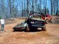 Jeep Wrangler crushing a car