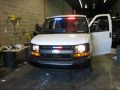 2010 chevy express van outfitted with emergency lights, sirens and seating/storage system. installed in vehicle are able 2 led by the inch in the front and rear, fed sig 650003 siren system, truckvault custom cabinet system and custom carpeted paneling.