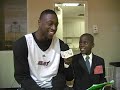 Dwyane Wade is Interviewed by Student Reporter Damon Weaver Dwyane Wade is Interviewed by Student Reporter Damon Weaver