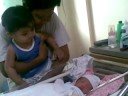 baby brother meets her baby sister for the first time