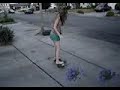 belle trying to pick up a skateboard; the cool way