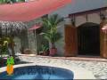 videos de Esterillos Costa Rica home with Arched doorways