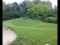 tom jumpin sand trap at a golf course