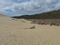 Sand dune surfing