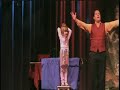 los angeles comedy illusionist tim mannix performs his version of the chair suspension for a 2007 halloween audience in redlands, california.