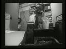 Scene from LEFTY-RIGHT (Cobb on phone)