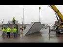 See a flood gate installed