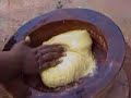Our friend Jones pounding fufu in Mampong Ashanti Ghana.  Fufu is probably the most popular food in Ghana, made from plantain and cassava.