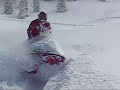 Snowmobiling in deep snow Snowmobiling in deep snow
