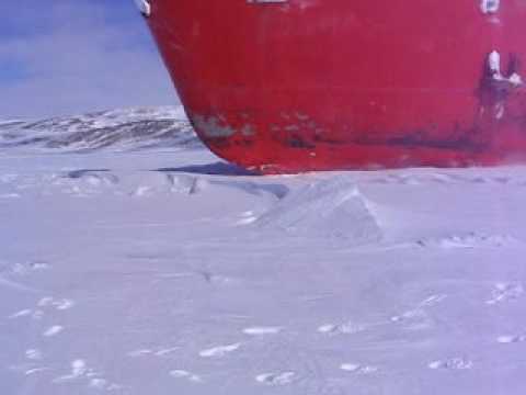Ship sailing through ice