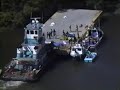 aerial and boat views of amtrak train derailment mobile al