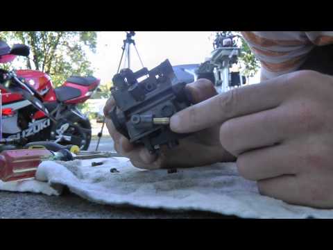 how to clean outboard carburetor