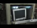 Monitor smashed in a compactor