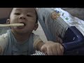Baby learns to brush tooth