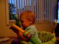 Carter trying to talk while playing in his bouncer 