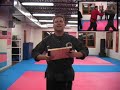 Wolfpack Martial Arts of Colorado Springs, Colorado breaking boards with Bolder Board Holder. Wolfpack trains both Karate and Taekwondo.