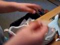 Hannah tying her shoe 