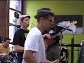 the redlights (feat. vic ruggiero and glen pine of the slackers, phil wartell of rudie crew/stubborn all stars/king django/radiation kings/hotter fire/jammyland all stars, and ira heaps of king django/ari-up/jammyland allstars/hotter fire, performing an on the fly set at buffalo exchange, a wicked thrift shop in williamsburg, brooklyn on 8/26/06. performing 