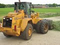 Case loader op kuil Case loader op kuil