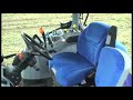 Behind the wheel of the New Holland T6080