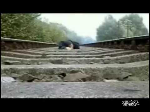 Train runs over a man CRAZY STUNT